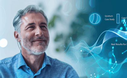 Man with gray hair wearing headphones, smiling with digital graphics in the background.